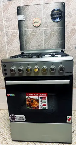 Geepas 4-Burner Freestanding Gas Cooker with grilled oven - perfect Condition