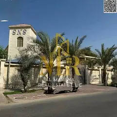 Luxury villa for sale in Al Rawda 3 | 10,000 sq ft | 9 master bedrooms | Majlis and living room | Mo