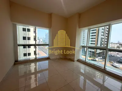 Spacious 2BR Apartment with Basement Parking | Prime Hamdan Street Location