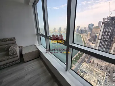 Spacious 4 Bedroom Apartment with Sea View, Free AC and Parking in Al Majaz 3