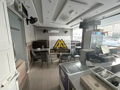 فرصة استثمارية مميزة جدًا لامتلاك مطعم جاهز وشغال في منطقة حيوية بكورنيش عجمان – النخيل 2، موقع ممتاز ثاني صف من الكورنيش وبالقرب من ديوان الحاكم، منا