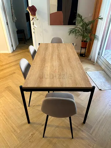Modern wooden dining table with 4 upholstered chairs - good condition