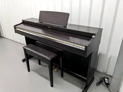 Yamaha Arius YDP162 with piano bench. Perfect working. Cash on delivery with six months warranty.