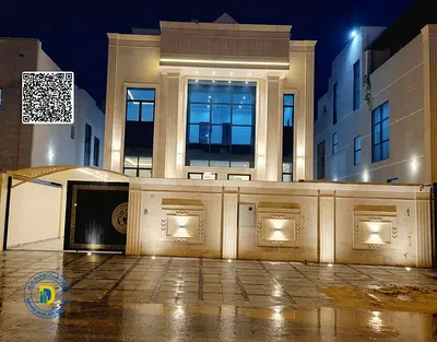 For sale: 5BR villa with roof in Al-Helio 2, Reg fees, electricity, water, and AC. Freehold and bank financing