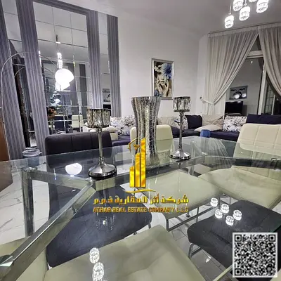 Two-bedroom apartment with a living room, fully furnished with new furniture, available for monthly rent in Ajman - Al Rashidiya 1 - Oasis Towers