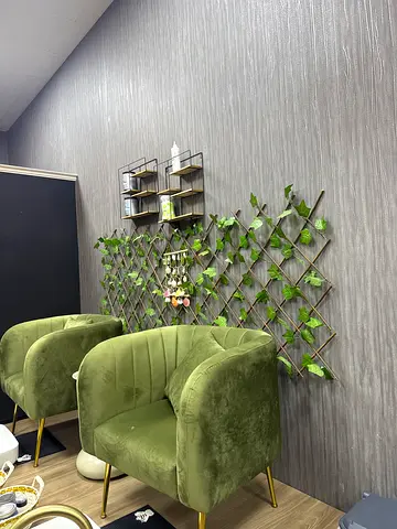 Pair of green velvet accent chairs with gold legs - used