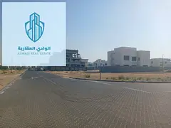 Residential land for sale in Al Hooshi area, Sharjah, on Maliha Road