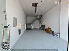 For annual rent: large shop with mezzanine in Al Mowaihat 3 Ajman, Academy Street, prime commercial