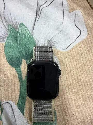 Apple Watch (Series/Model Unknown) with Gray Nylon Sport Loop - Good Condition
