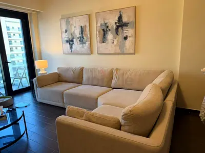 Beige L-shaped 4-5 seater Corner Sofa in Good Condition