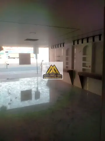 Commercial Shop with Mezzanine for Rent in Al Rashidiya 1 Ajman – Prime Location with Large Frontage and High Visibility