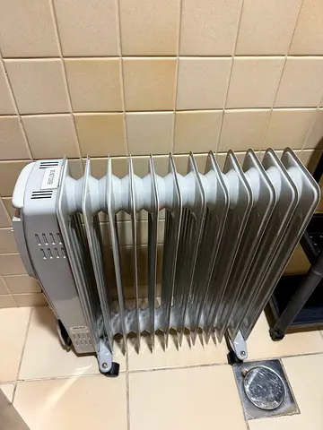 Oil-filled radiator heater - portable electric radiator, good condition