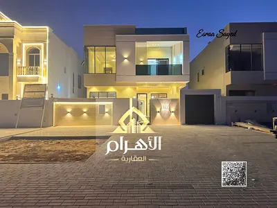 بارقي التشطيبات | تملك فيلا فاخرة بالزاهية عجمان | 5 غرف ماستر + 2 صالة | بسعر تنافسي شامل رسوم التسجيل والتملك