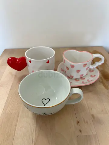 Set of 4 heart-themed ceramic mugs and cups - good condition