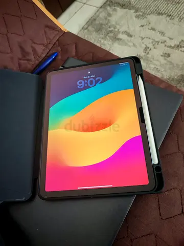 iPad (with Apple Pencil) in protective folio — Good condition