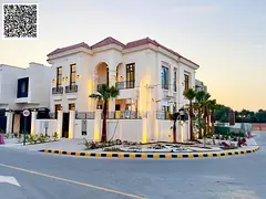 Luxury villa on a corner lot overlooking Al Hamidiya Park, with a private garden and pool – high-e