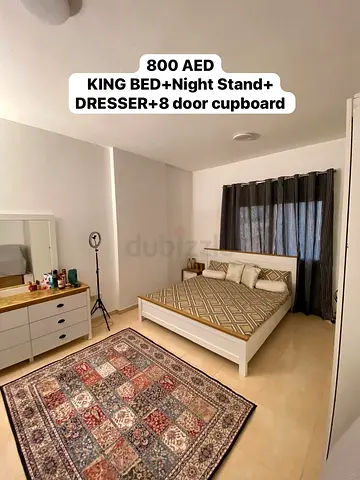 King bedroom set — bed, nightstand, dresser  8‑door cupboard (800 AED)