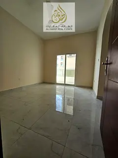 Three rooms, a hall, two bathrooms with a balcony in Al Aaliyah on Mohammed Bin Zayed Road