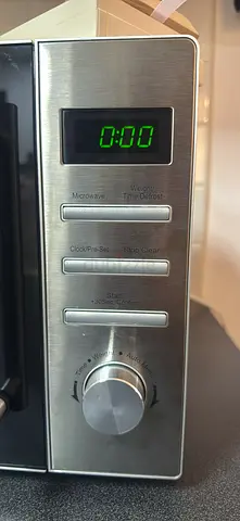 Used Stainless Steel Microwave Oven - perect Condition almost new