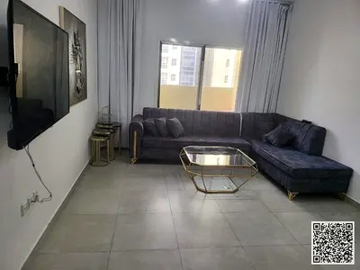 Luxury apartment, brand new, two bedrooms, living room, and balcony. Ajman, Al Jurf. Fully furnished. Monthly rent.