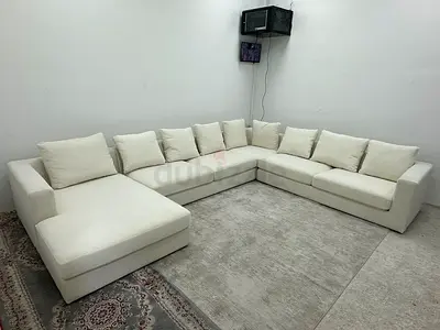 Brand new condition the one brand crem color Ushape sofa