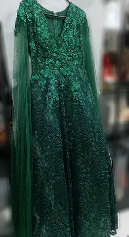 Party dresses Emerald color with crystal. Still new Size M-L