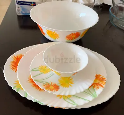 17 items for AED 50- Tea Cups/saucers, plates, large bowl, large tray