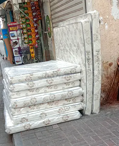 Set of 8 New Single Mattresses in Plastic - Floral Pattern