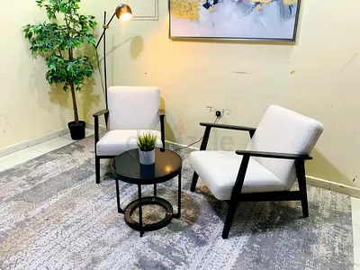 Pair of Modern Lounge Chairs with Side Table