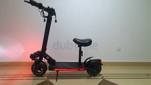 Electric scooter with seat — sturdy, lights, ready to ride