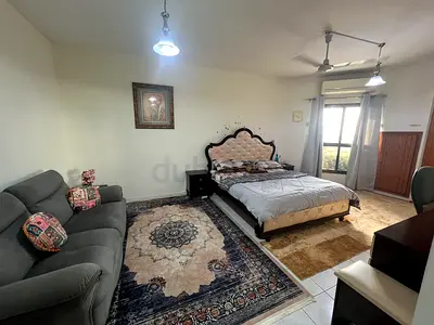 Spacious furnished Master Room with attached bath with Buhairah Corniche view.