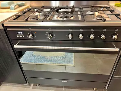Smeg Top gas oven electric combination stove oven black colour 90x60cm