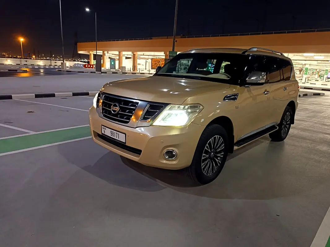 Nissan Patrol 2014 — photo 1 of 13