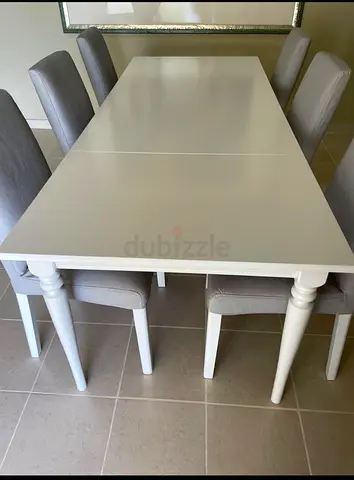 Expandable dining table and 6 chairs