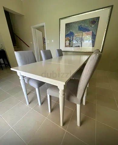 Expandable dining table and 6 chairs