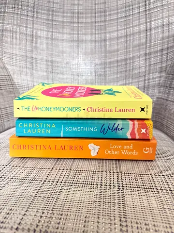 Set of 3 Christina Lauren novels: The Unhoneymooners; Something Wilder; Love and Other Words
