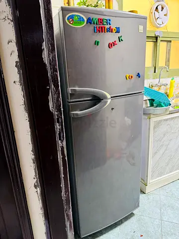 Used Silver Double-Door Refrigerator - Good Working Condition