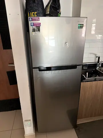 Used stainless steel refrigerator with bottom freezer - Good condition