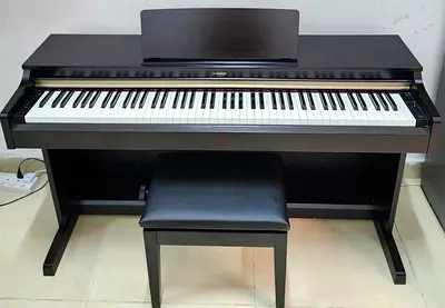 The Yamaha Arius YDP-162 is an 88-key digital piano featuring a Graded Hammer (GH) keyboard