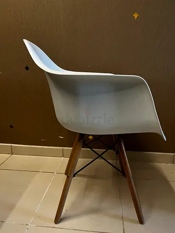 White Molded Plastic Dining Chair with Wooden Eiffel Legs - Good Condition
