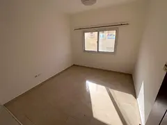 Two bedrooms and a living room – 2 bathrooms – central air conditioning – prime location behin