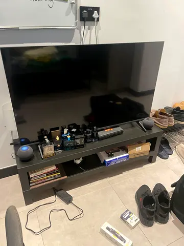 55-65 inch Flat Panel Smart TV with Entertainment Unit (used)