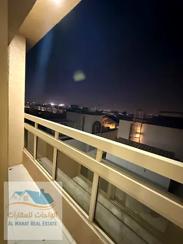 A studio apartment with a balcony and separate kitchen is now available for monthly rent in Al Muwa