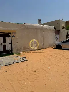 For sale: House in Al-Qadisiyah, 4000 sq ft, divided into 4 sections