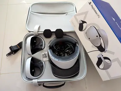 PlayStation VR2 headset with controllers and carrying bag, like new