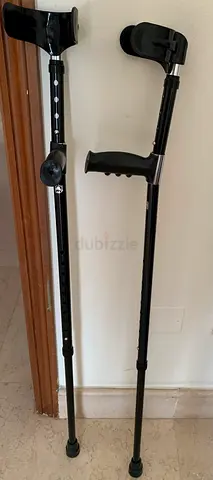 Pair of adjustable forearm crutches — lightweight, good condition