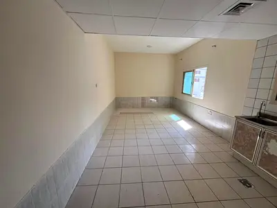Modern Layout with Semi-Closed Kitchen | Fully Bright Interiors | Direct Access to Dubai & Sharjah