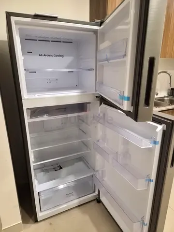 Silver Double-Door Refrigerator - Good Condition