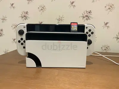 Nintendo Switch OLED (White) with Dock and Game Card Overcooked 1 and 2 Price negotiable
