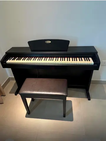 Piano Suzuki Digital piano with stool AED 1395